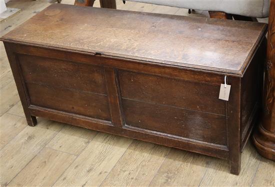 A small 18th century panelled oak coffer W.112cm